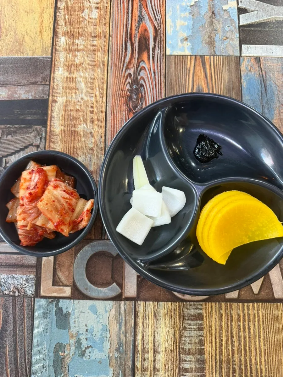 Self-serve bar in the restaurant where diners can get kimchi