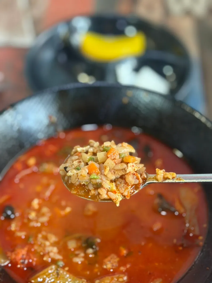 Fried rice mixed into the jjamppong broth