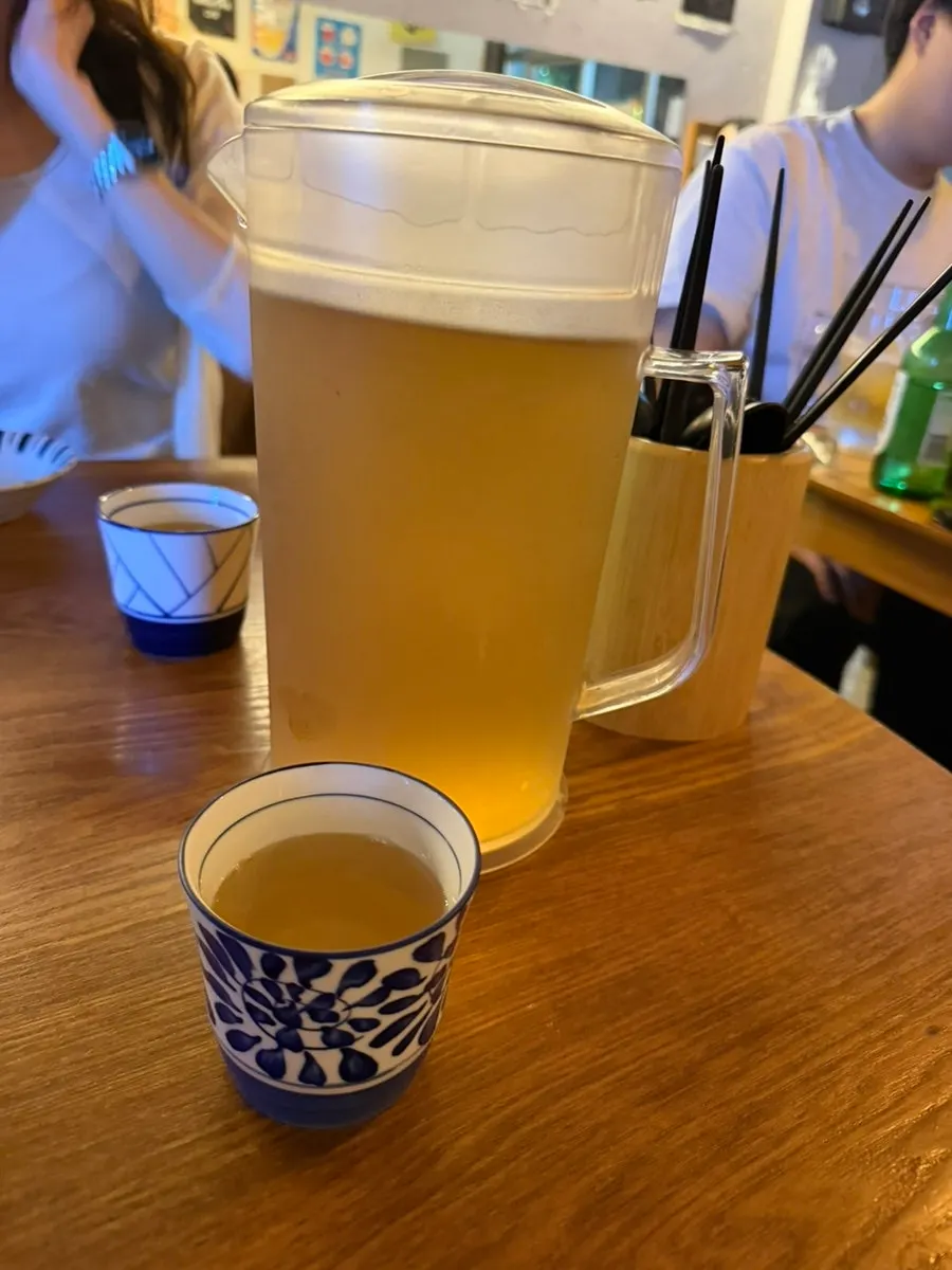 Barley-tea-like complimentary water served at Gyodong Nakwon