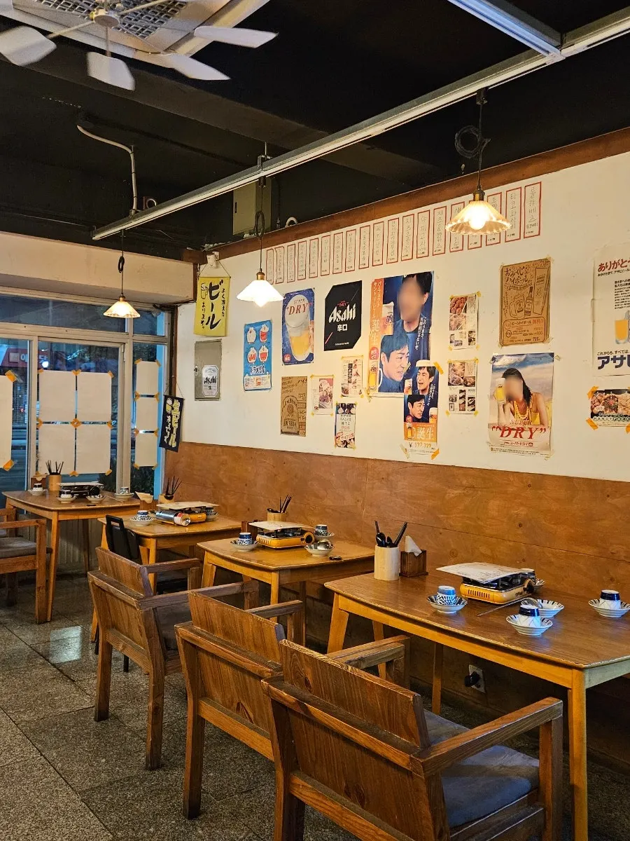 Japanese-style posters and props on the wall at Gyodong Nakwon