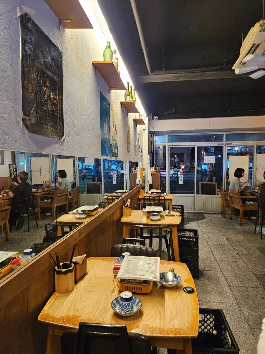 Table seats at Gyodong Nakwon under soft lighting