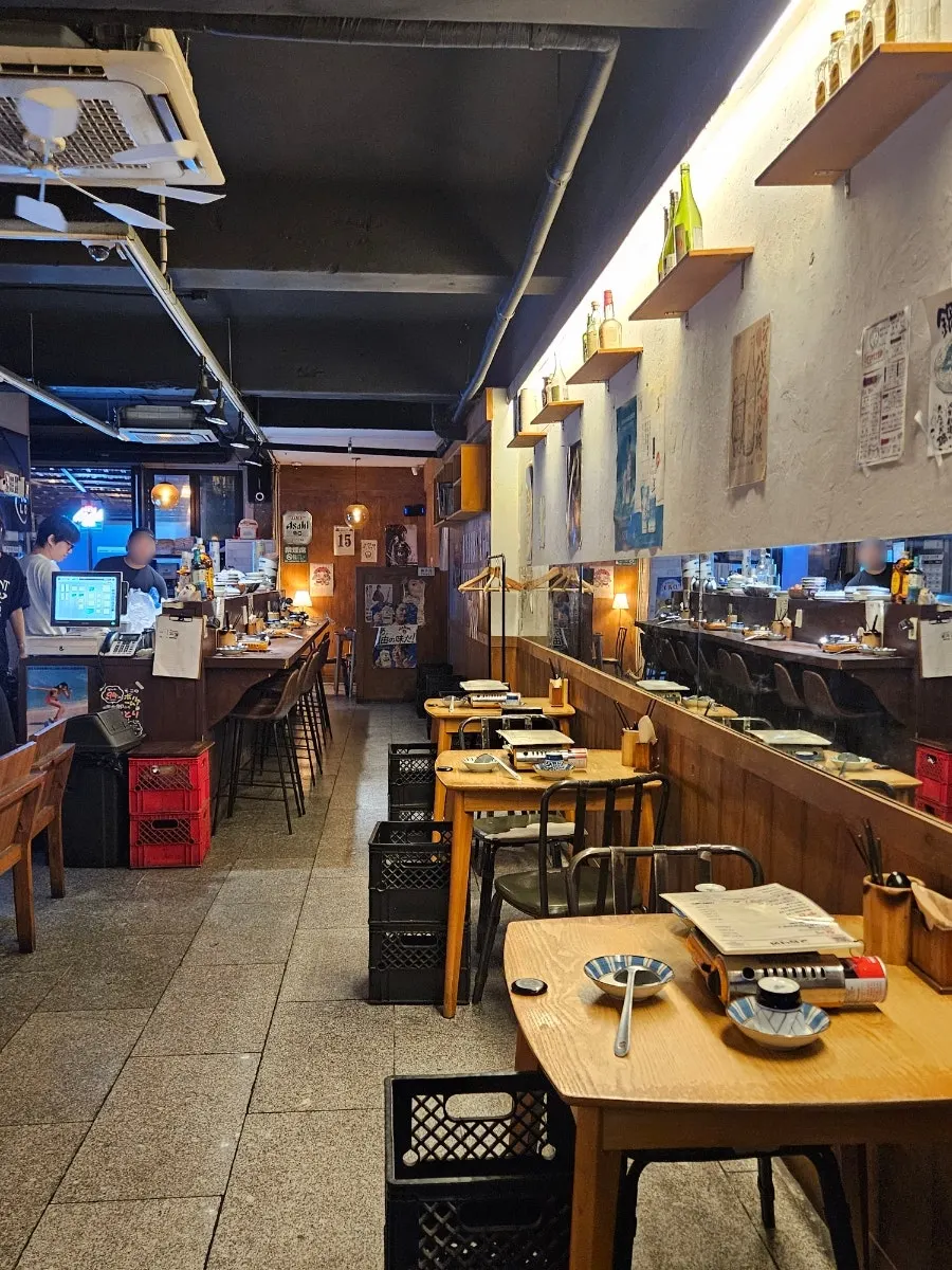 Indoor seating and izakaya atmosphere at Gyodong Nakwon