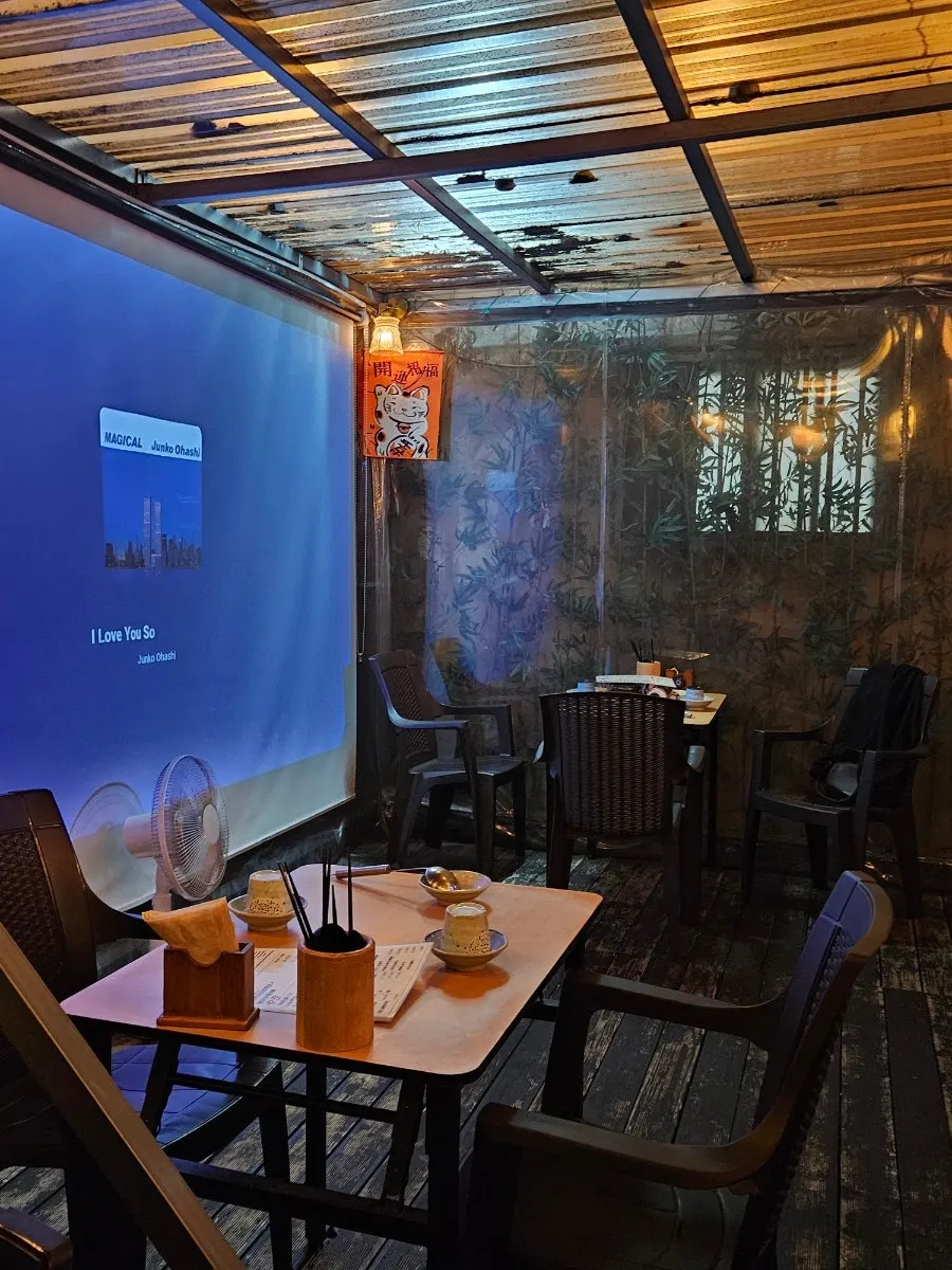 Outdoor terrace seating at Gyodong Nakwon