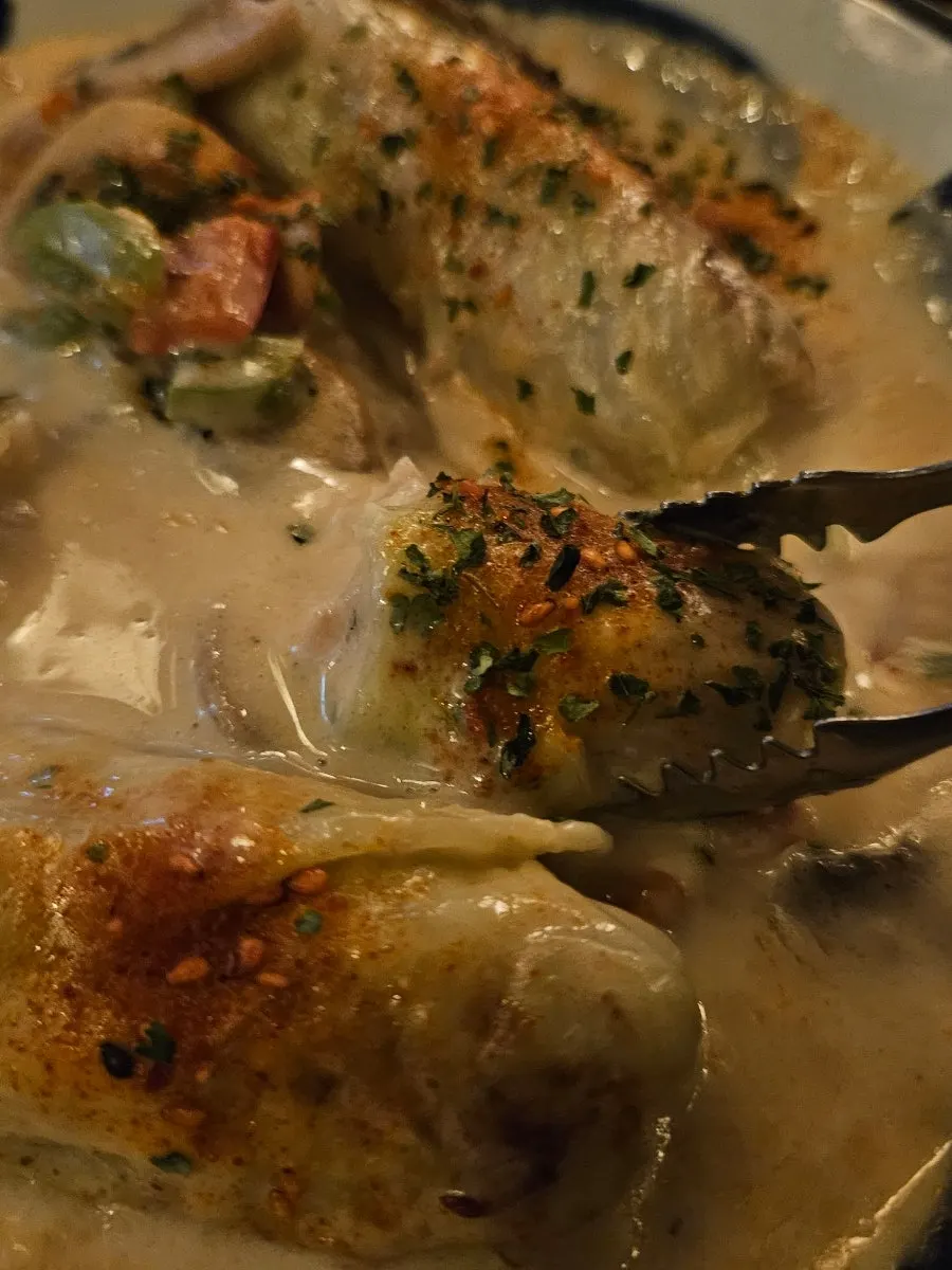 Cross-section of the cabbage roll showing soft cabbage and ground meat
