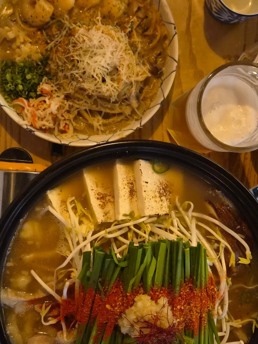 Crab tomalley pasta noodles twirled on a fork