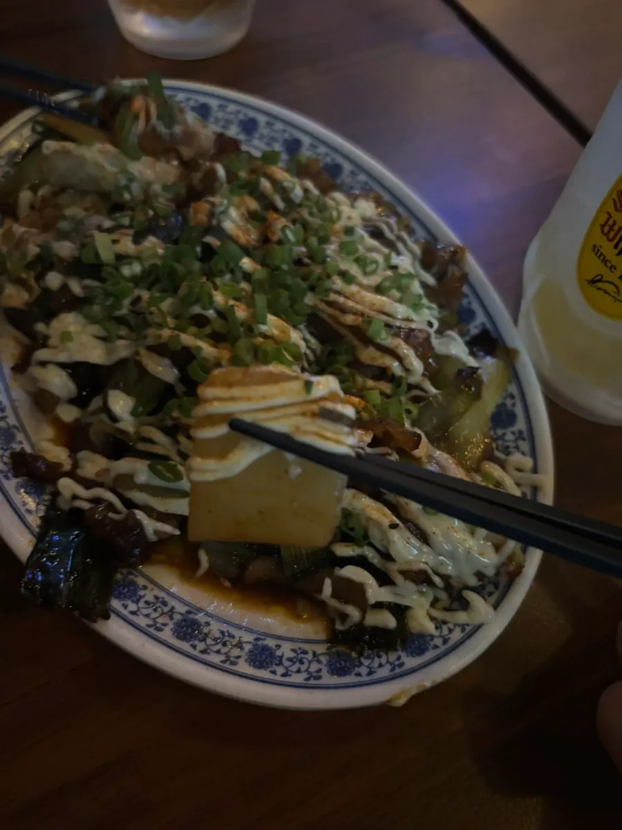 Beef tendon and scallion stir-fry at Gyodong Nakwon