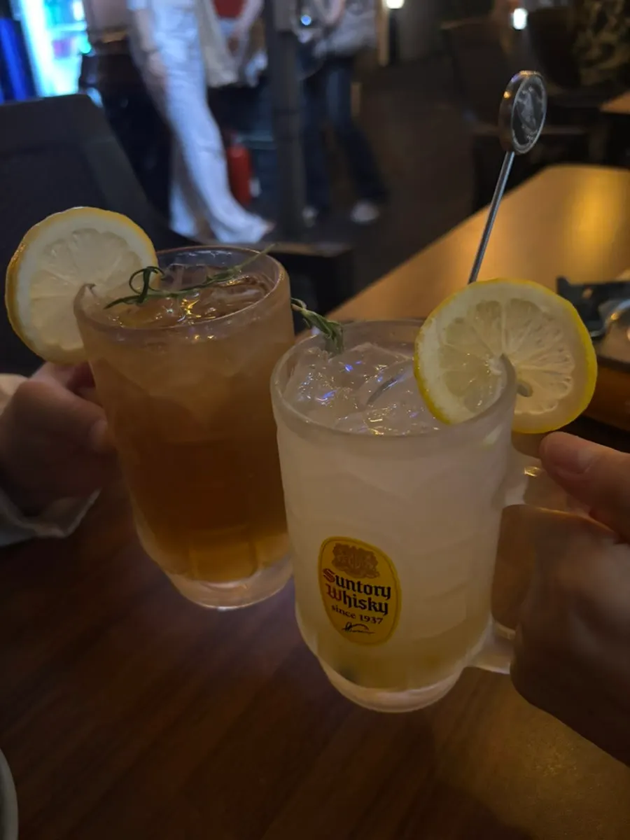 Two glasses: ume highball and non-alcoholic yuzu highball