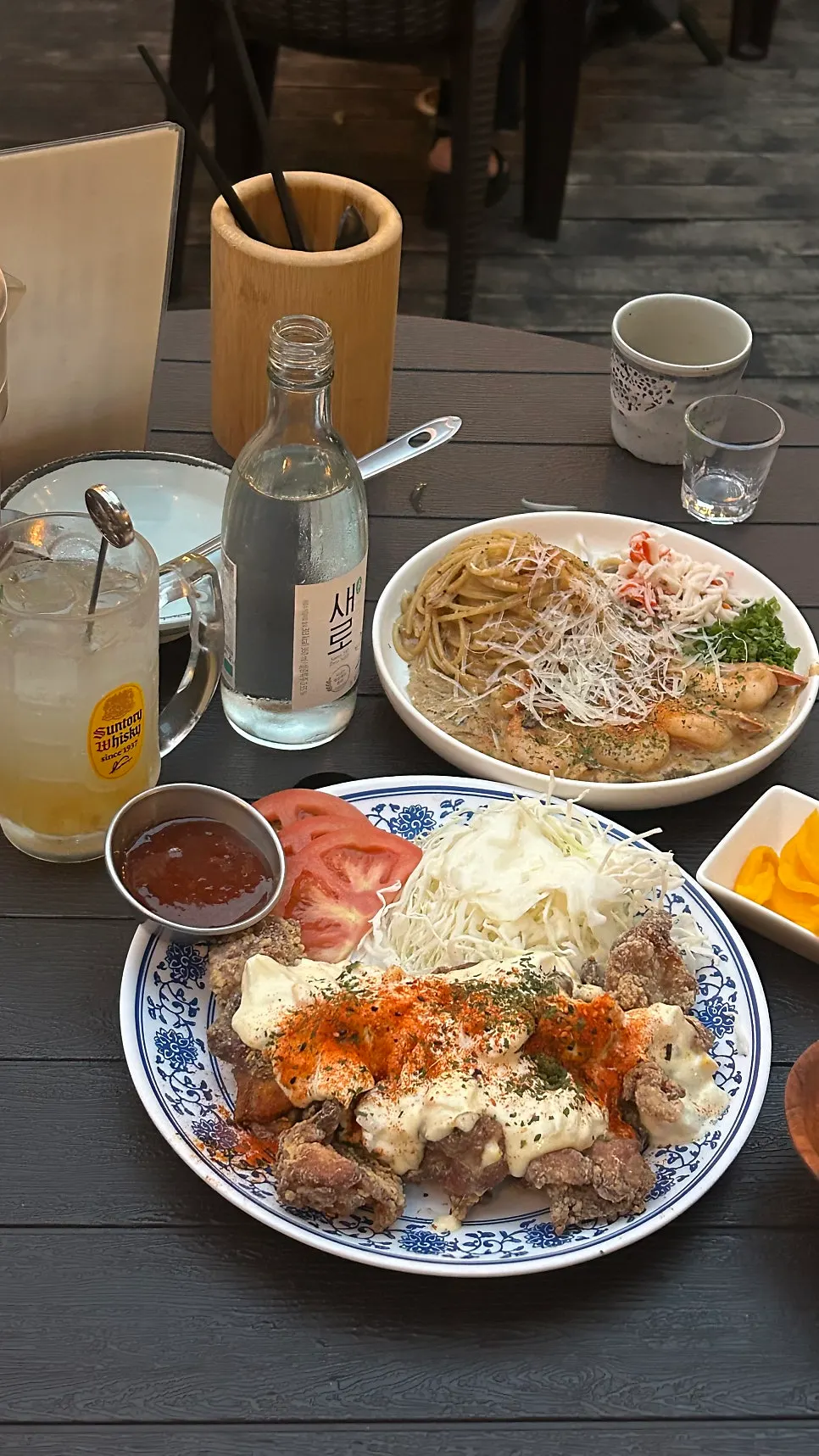 Drinking a highball on the terrace at Gyodong Nakwon