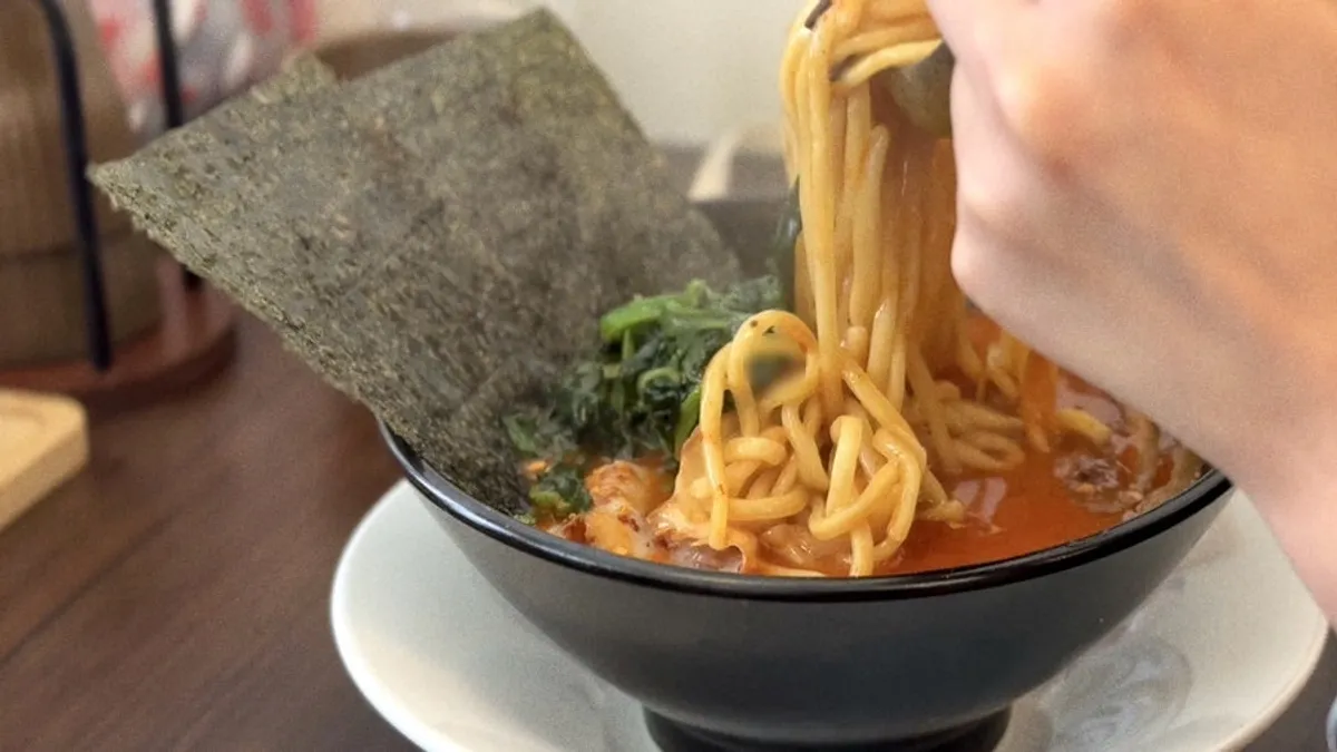 Karai iekei ramen topped with spinach