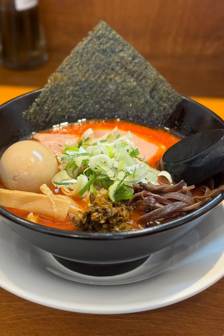 Lifting a strand of iekei ramen noodles