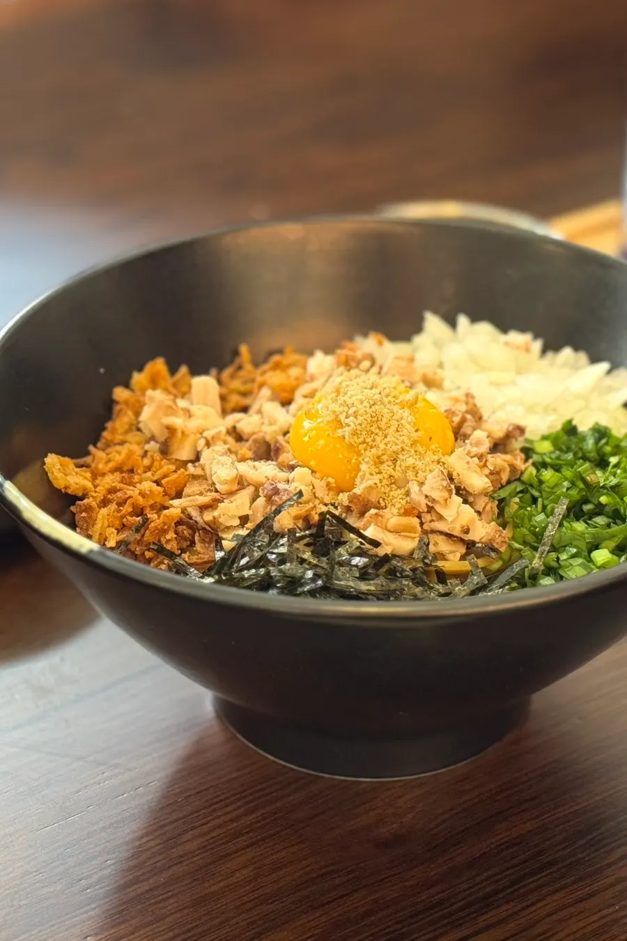 Mixing egoma aburasoba noodles