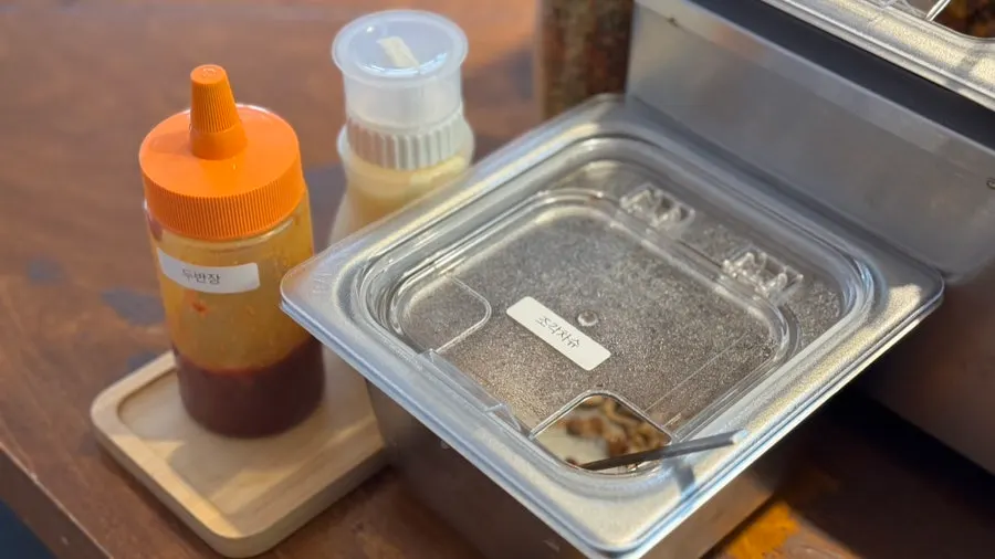 Self-serve corner with rice and toppings