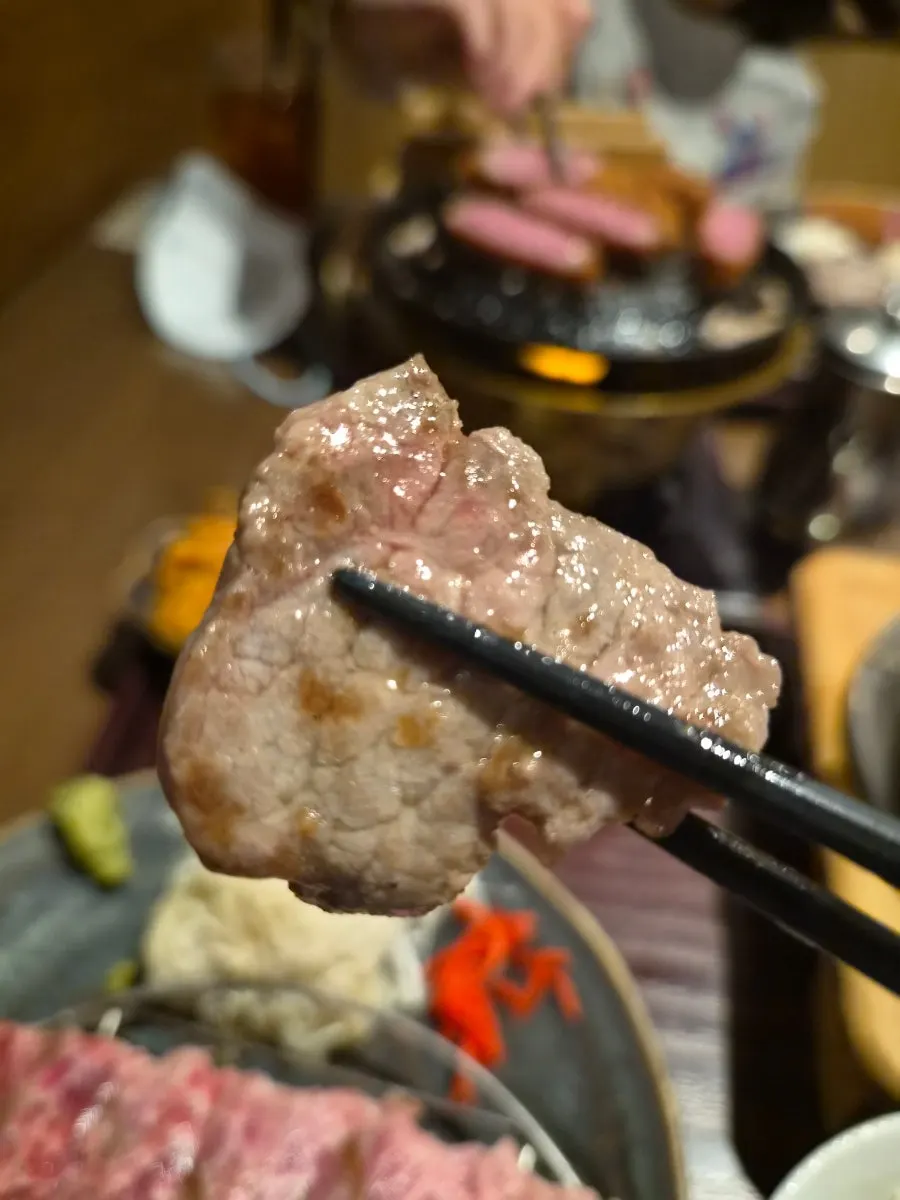 Family table sharing two meat dishes