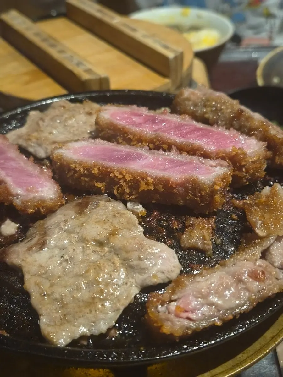 A small piece of gyukatsu grilled a bit at a time