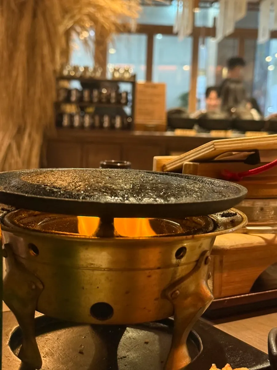Smoked gyukatsu grilling on a personal brazier