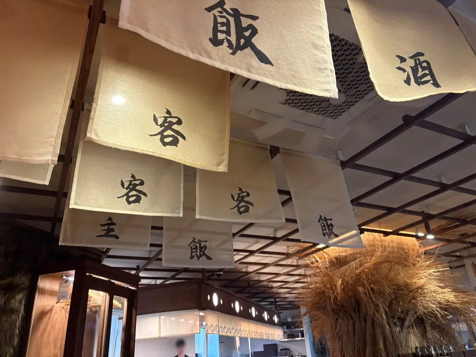 Wood-toned interior of the Gyudo Mapo Gongdeok Main Branch dining hall
