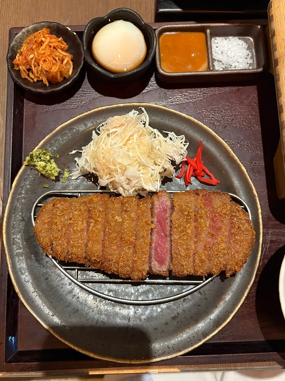 Smoked gyukatsu with a pink cross-section