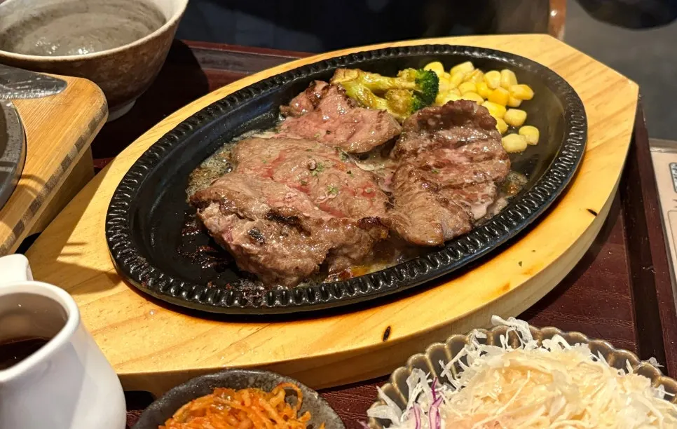 Steak with sauce poured over the top