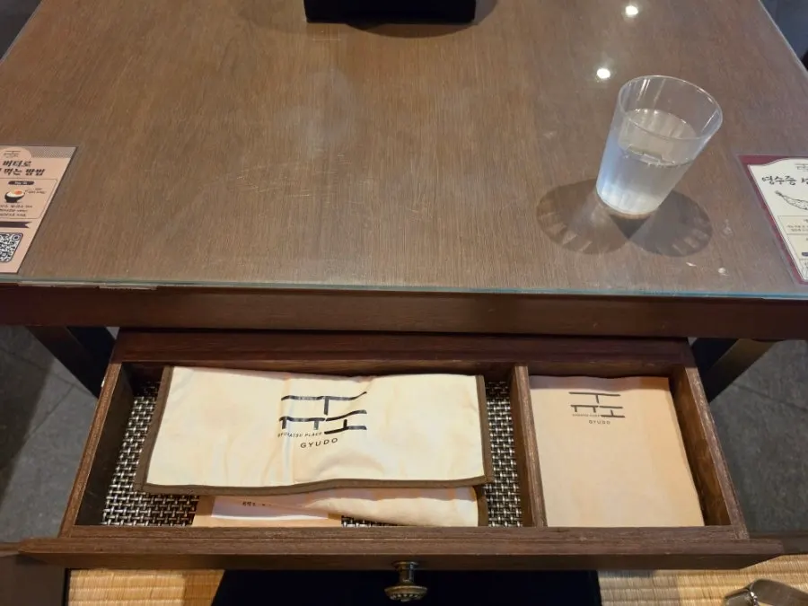 Cutlery drawer under the table