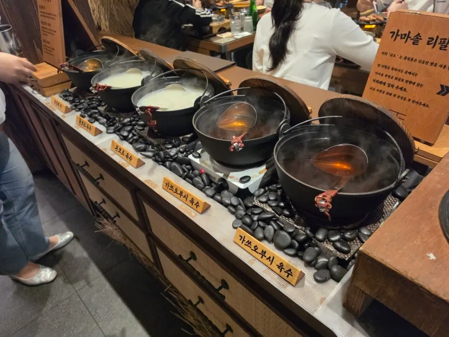 Self-serve bar with Solomon's seal tea, katsuobushi, and tonkotsu broths