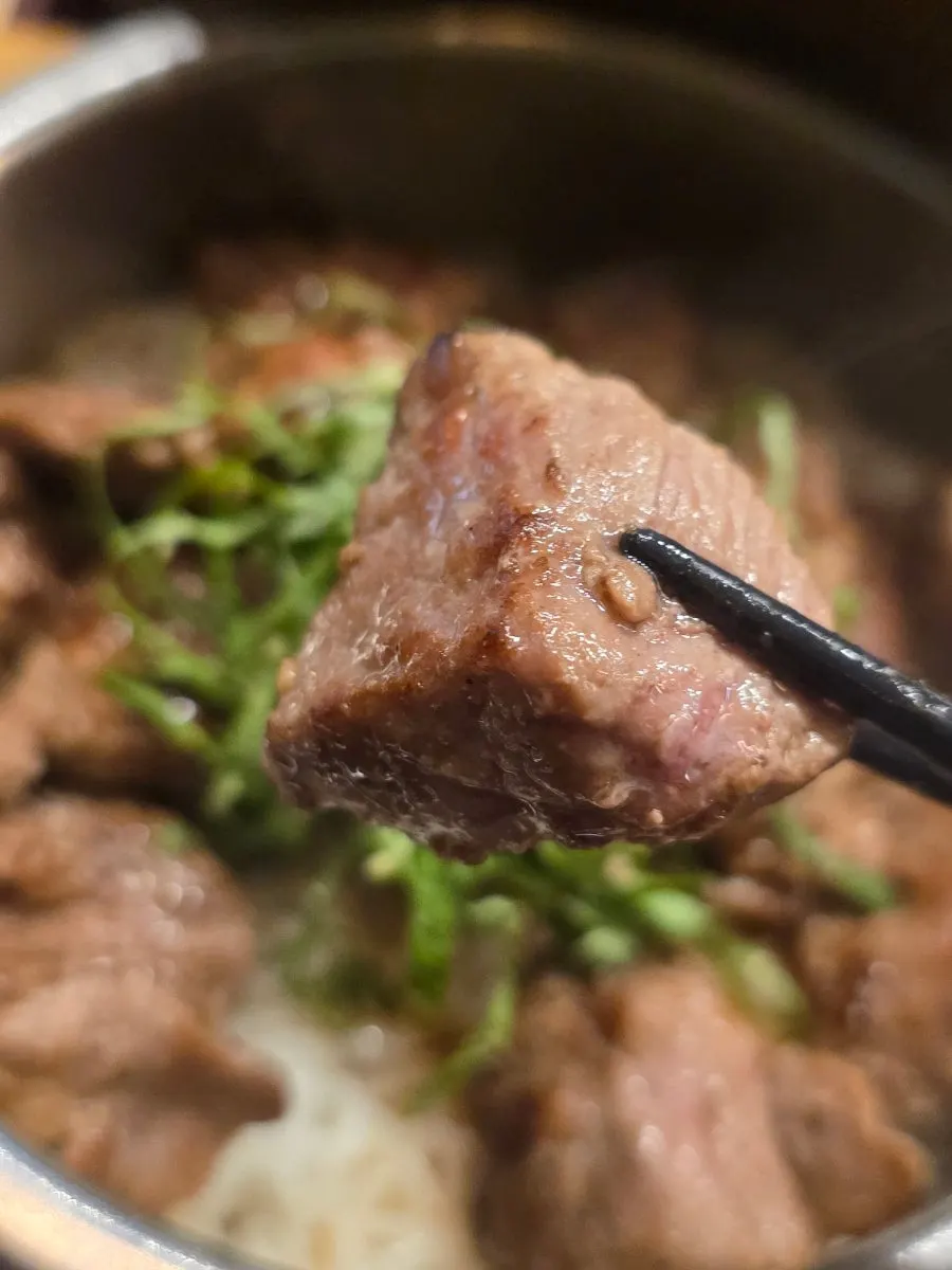 Niku mabushi pot rice piled high with meat