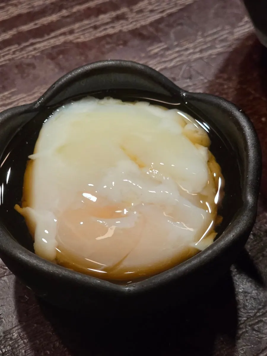 A full meal spread with gyukatsu and pot rice