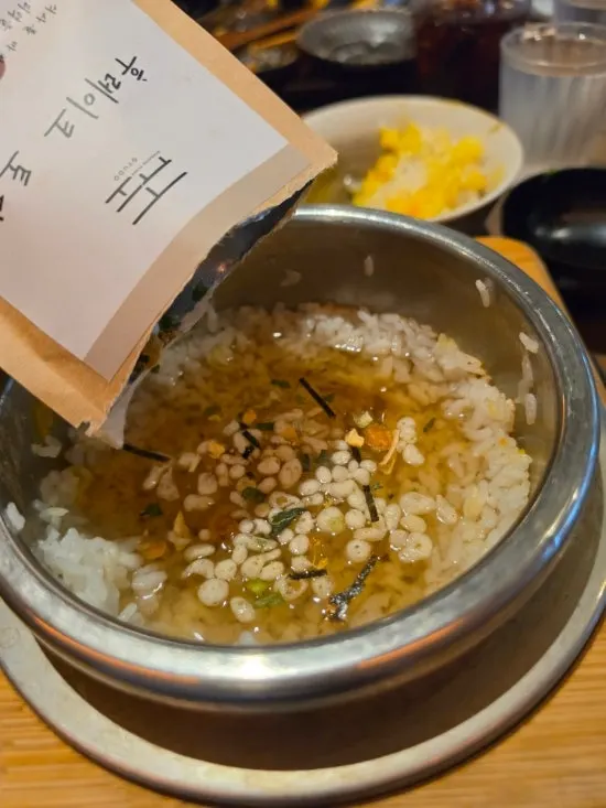 Handmade myeong-i wasabi and muchim radish salad on the side