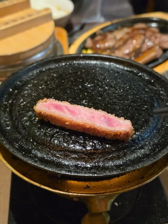 Grilling gyukatsu on the personal brazier