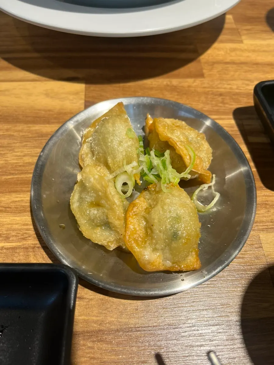 Plate of crispy fried gyoza