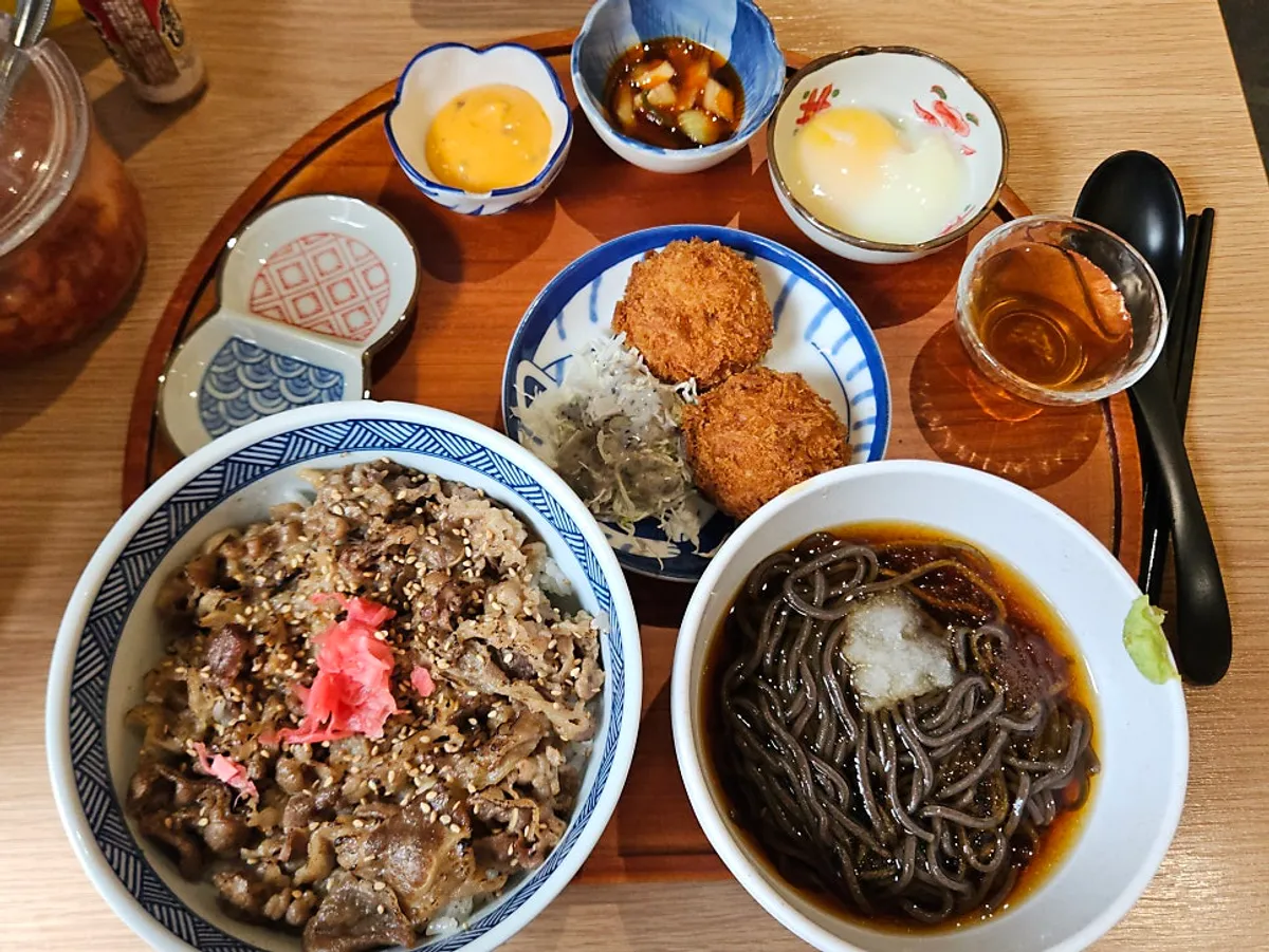 Gyudon han-sang tray with mini mobil, side dish, and poached egg