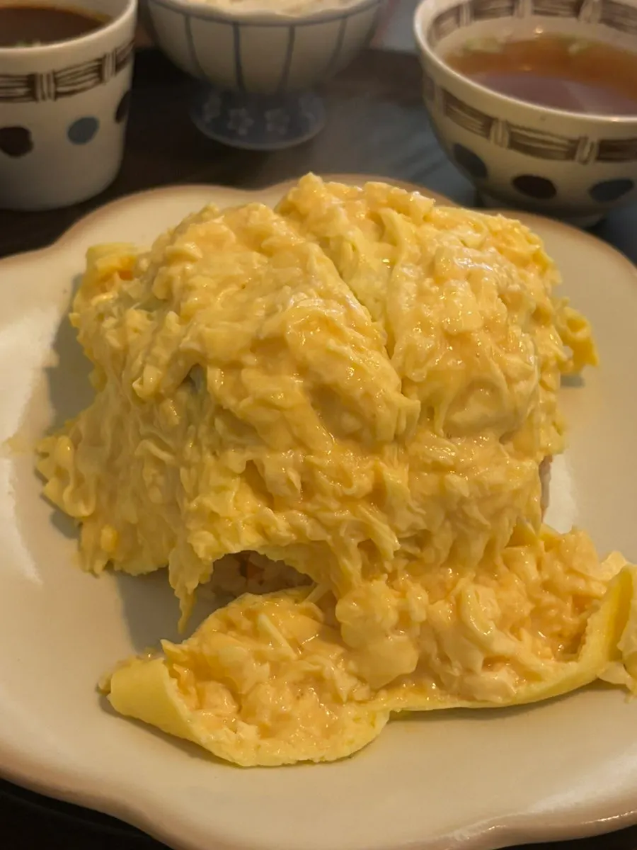 Omurice cut down the middle with a knife