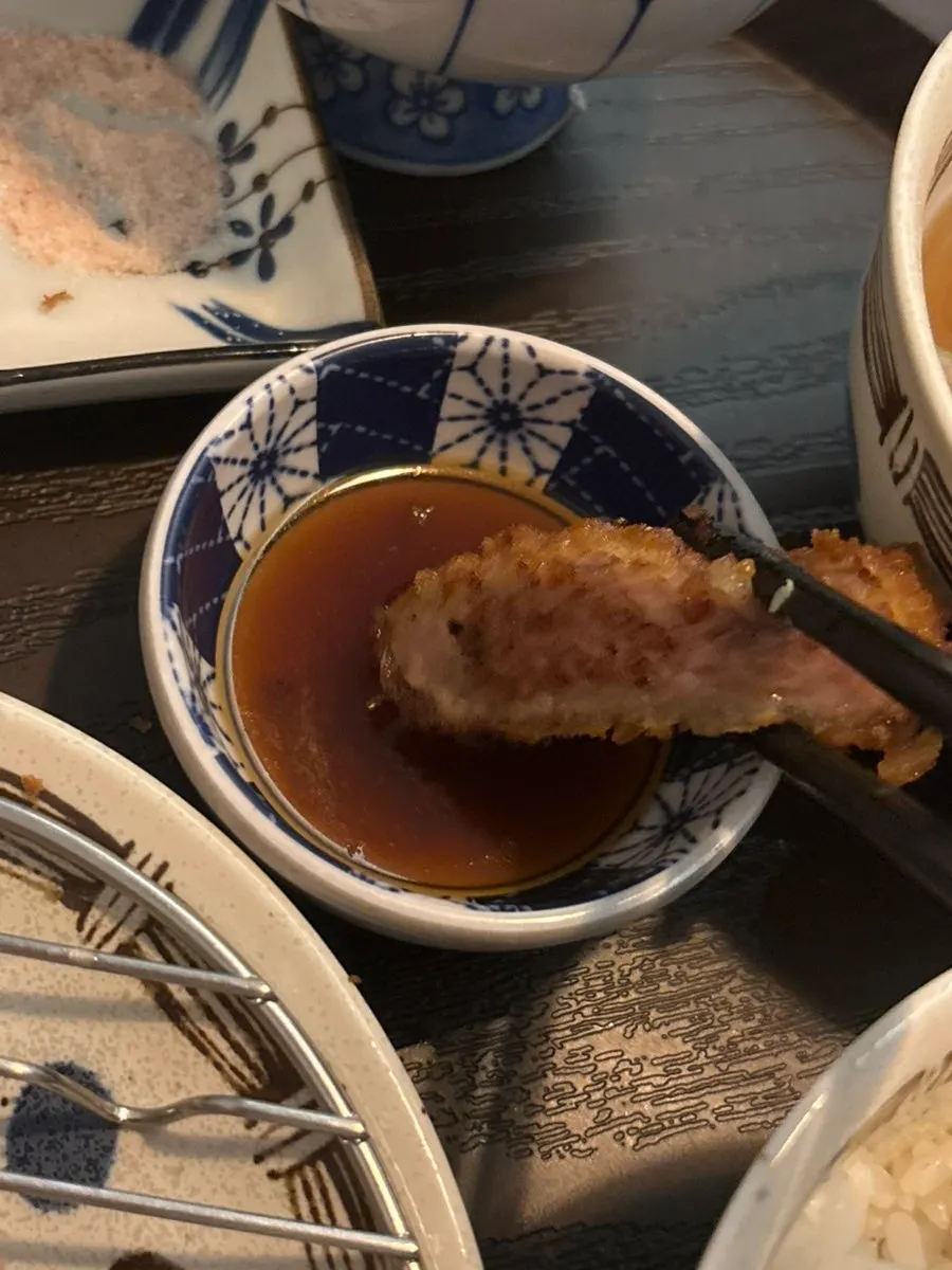 Gyukatsu dipped into the special sauce
