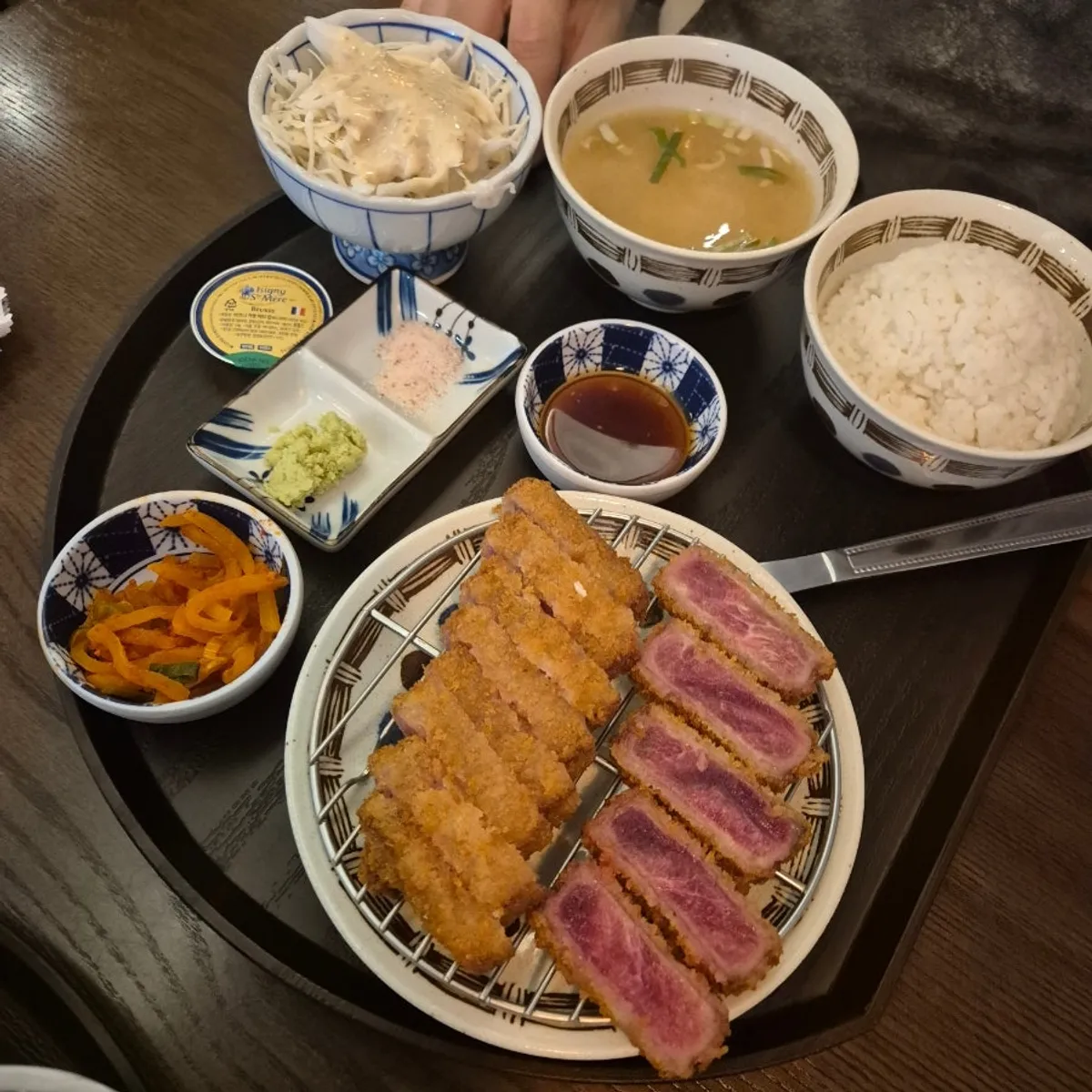 Tenderloin gyukatsu served with a lit tabletop brazier