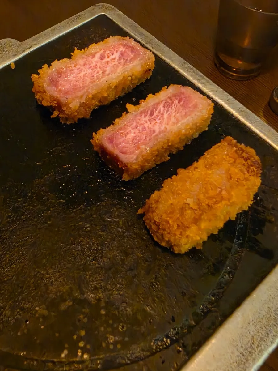 Gyukatsu being grilled on the personal charcoal grill