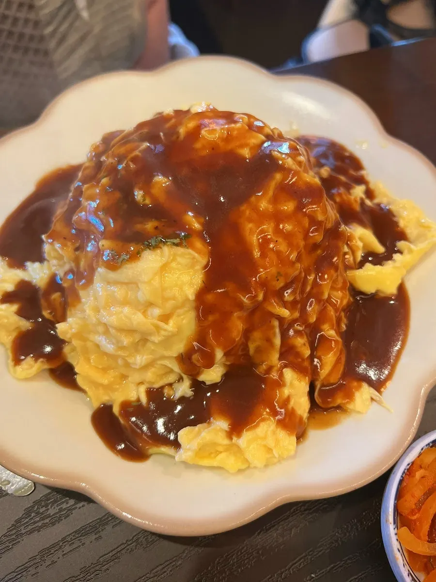 Hamburg omurice with the halved egg spread open