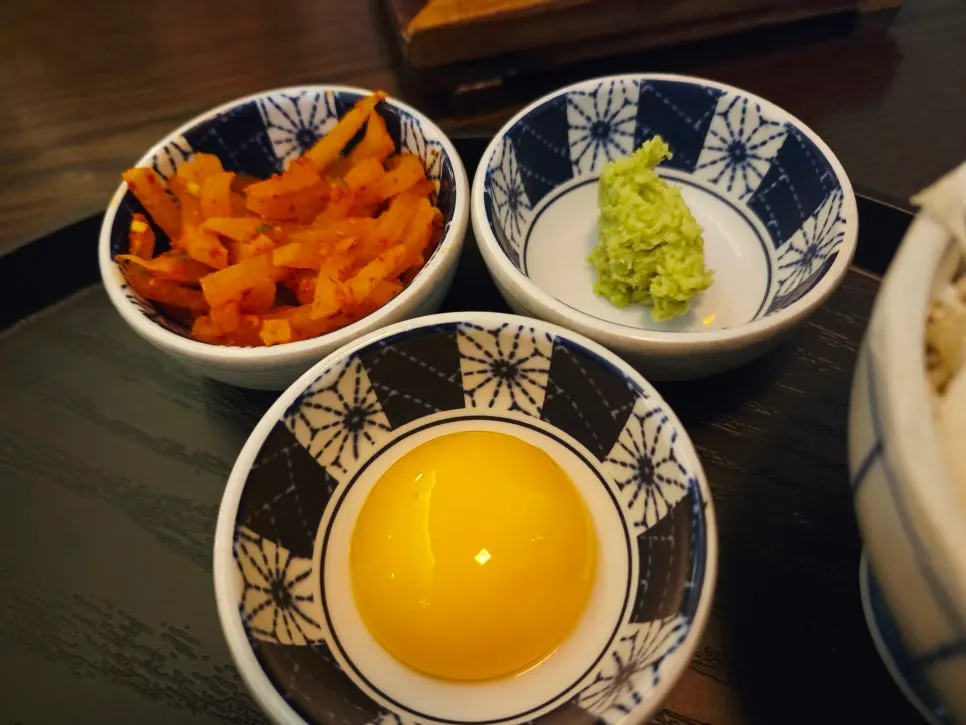 Steki rice bowl topped with egg yolk