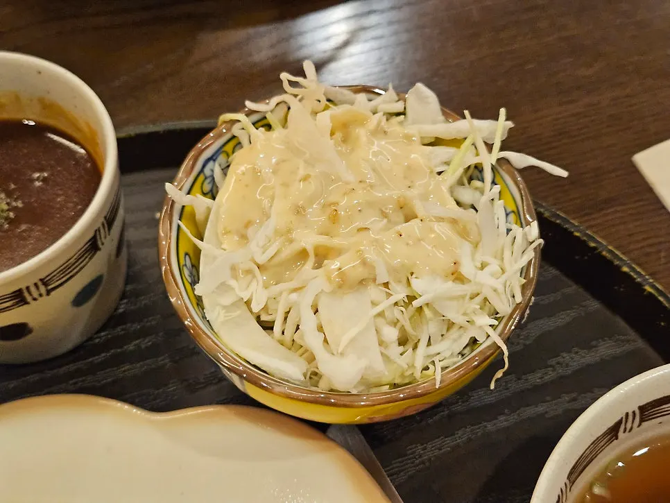 Standard side dishes of spicy radish salad and cabbage salad