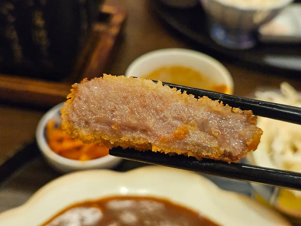 Close-up of gyukatsu's thin, crispy batter