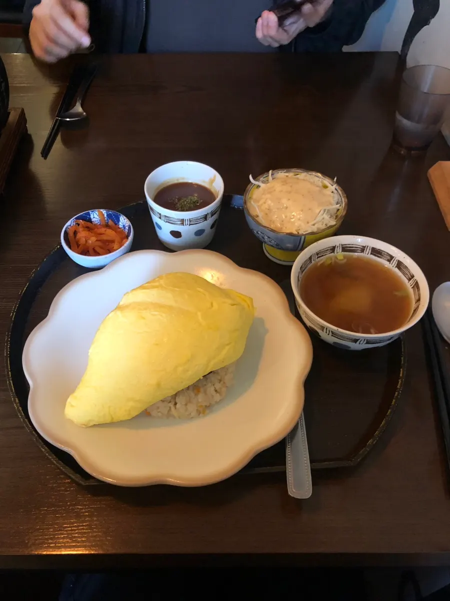 A grilled piece of sirloin gyukatsu dipped in sauce