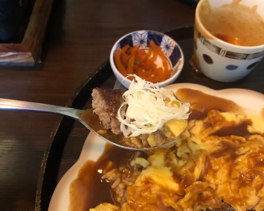 Fried rice omurice with the egg unfolded open