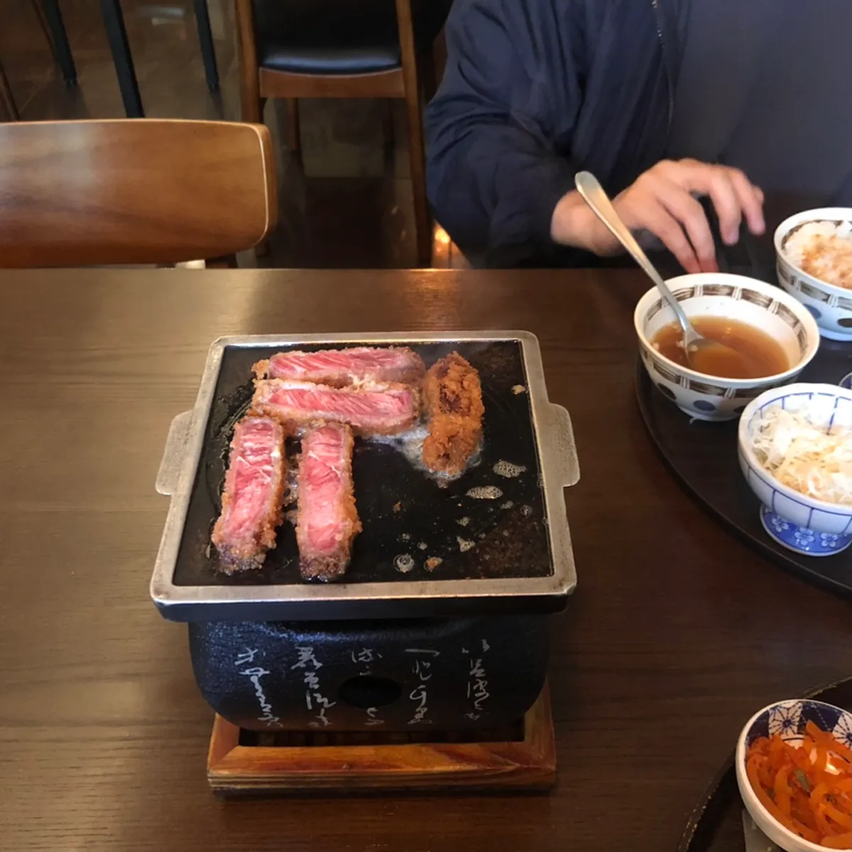 Table spread of sirloin gyukatsu and hambagu omurice at Gyuen-dang