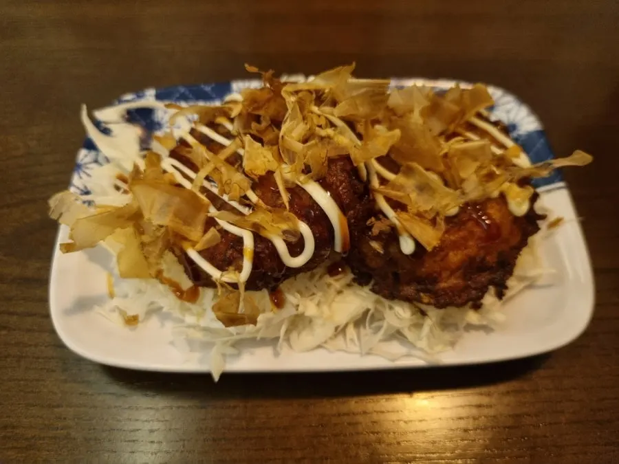 Table with mini okonomiyaki and gyukatsu together