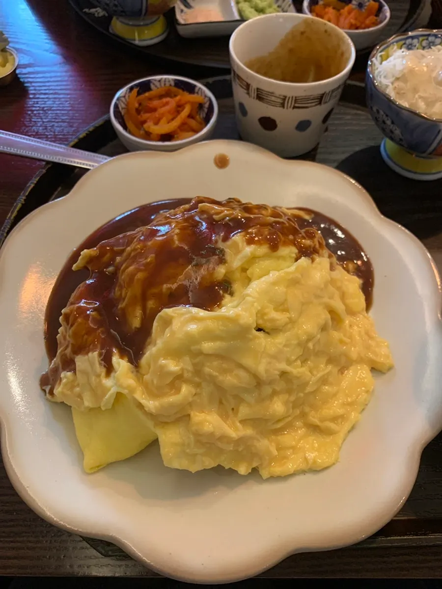 Table set with both gyukatsu and omurice
