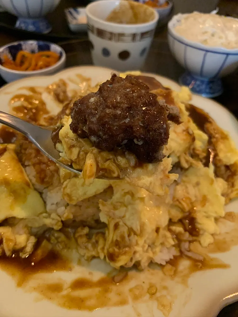 Cross-section of the sliced hamburg steak with sauce