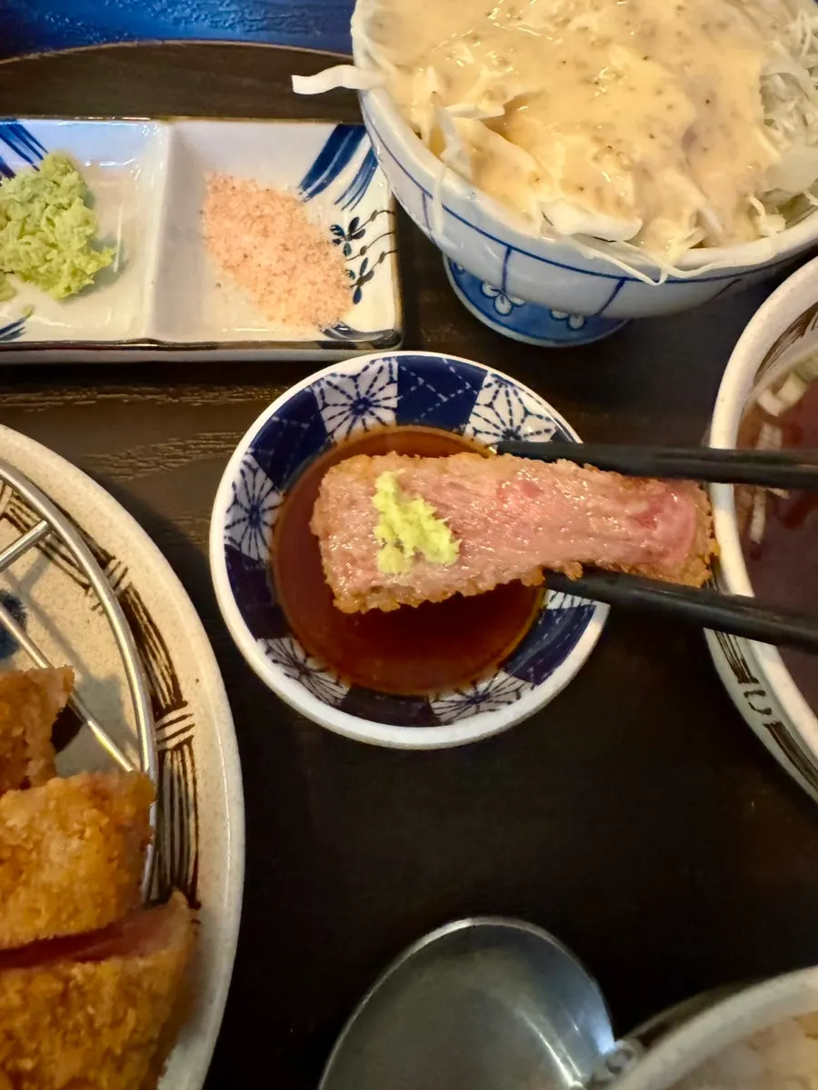 Gyukatsu grilled one piece at a time on the charcoal