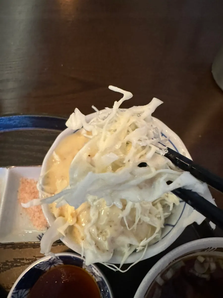 Cabbage salad and pickles for cleansing the palate