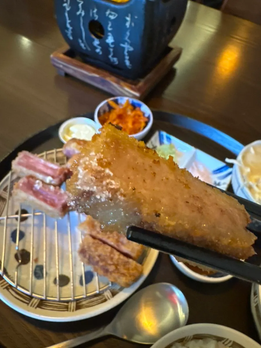 A piece of gyukatsu finished grilling in butter