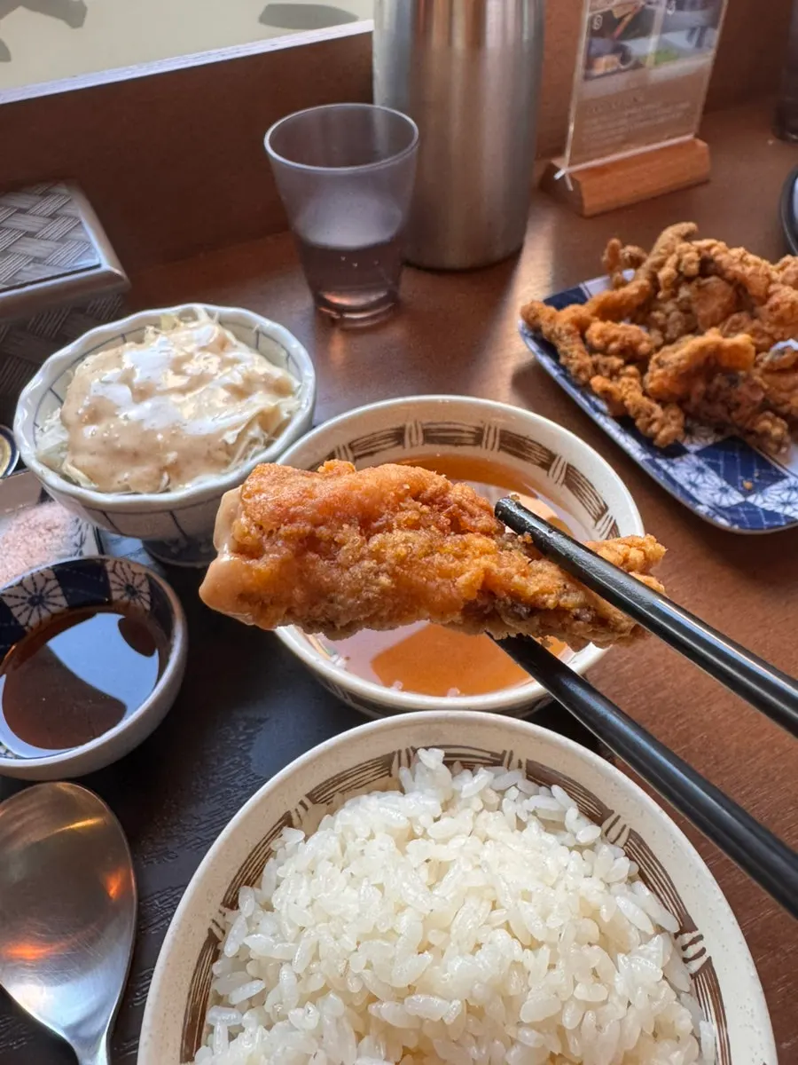 Eating gyukatsu and rice by the window at Gyuen-dang