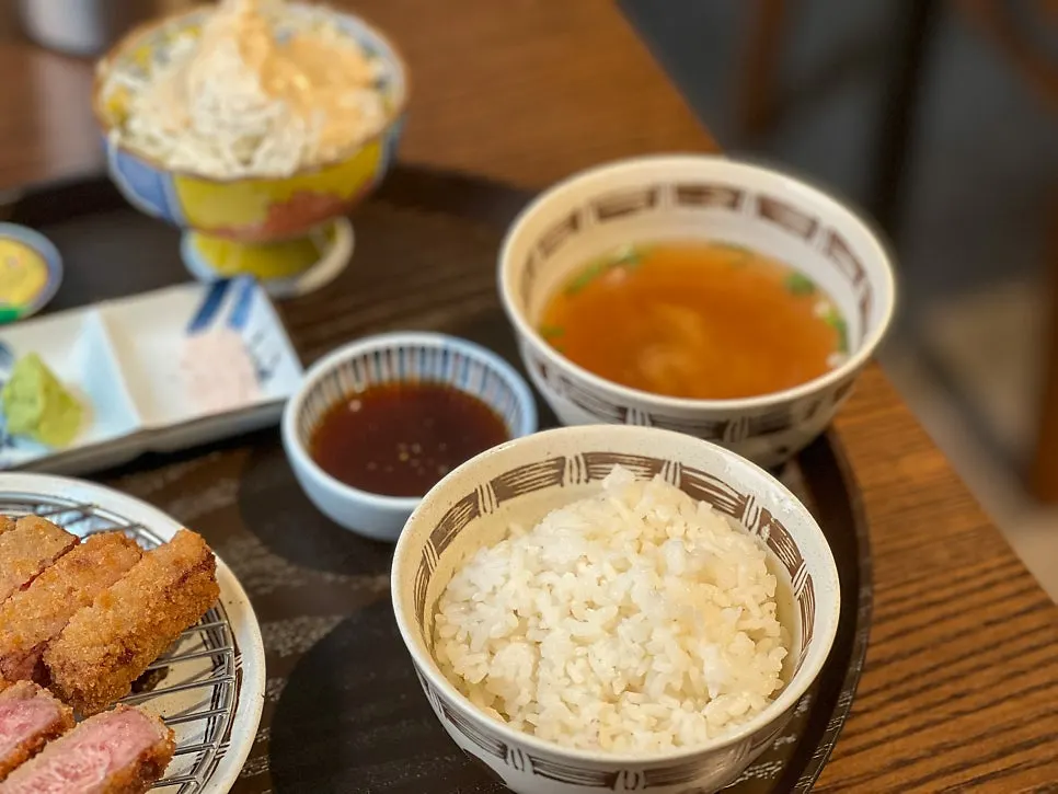 Tenderloin gyukatsu served with rice, salad, and miso soup