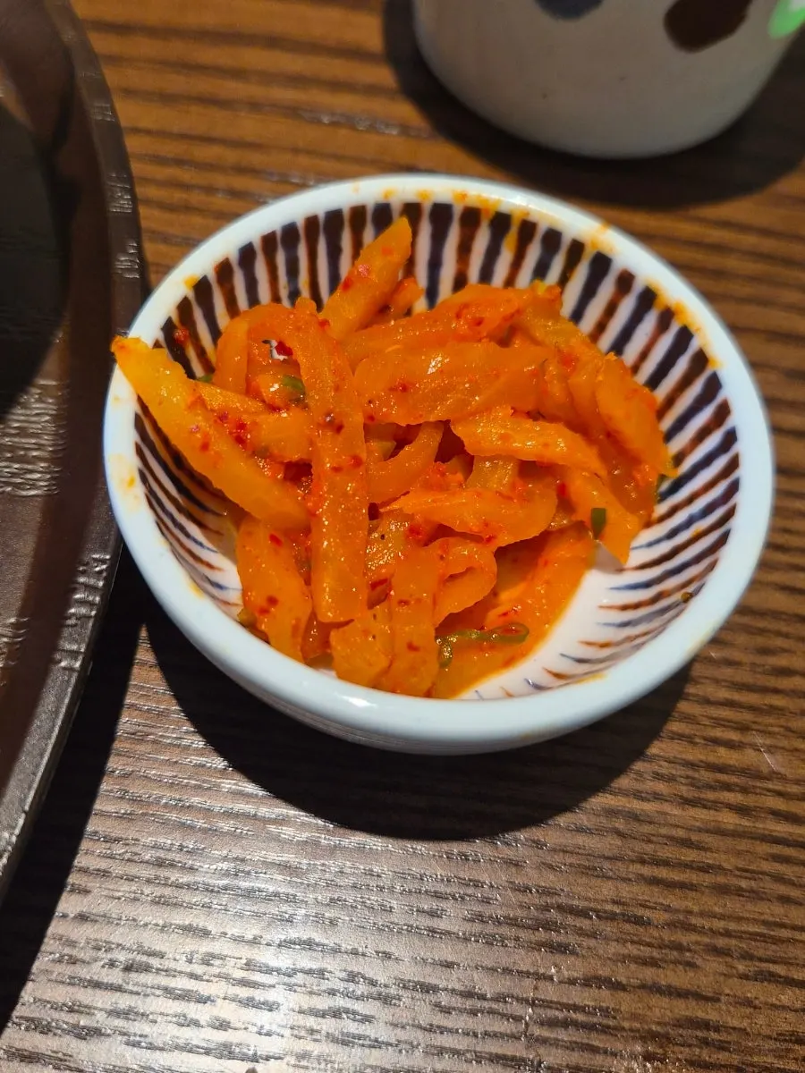 Seasoned pickled radish side dish that refreshes the palate